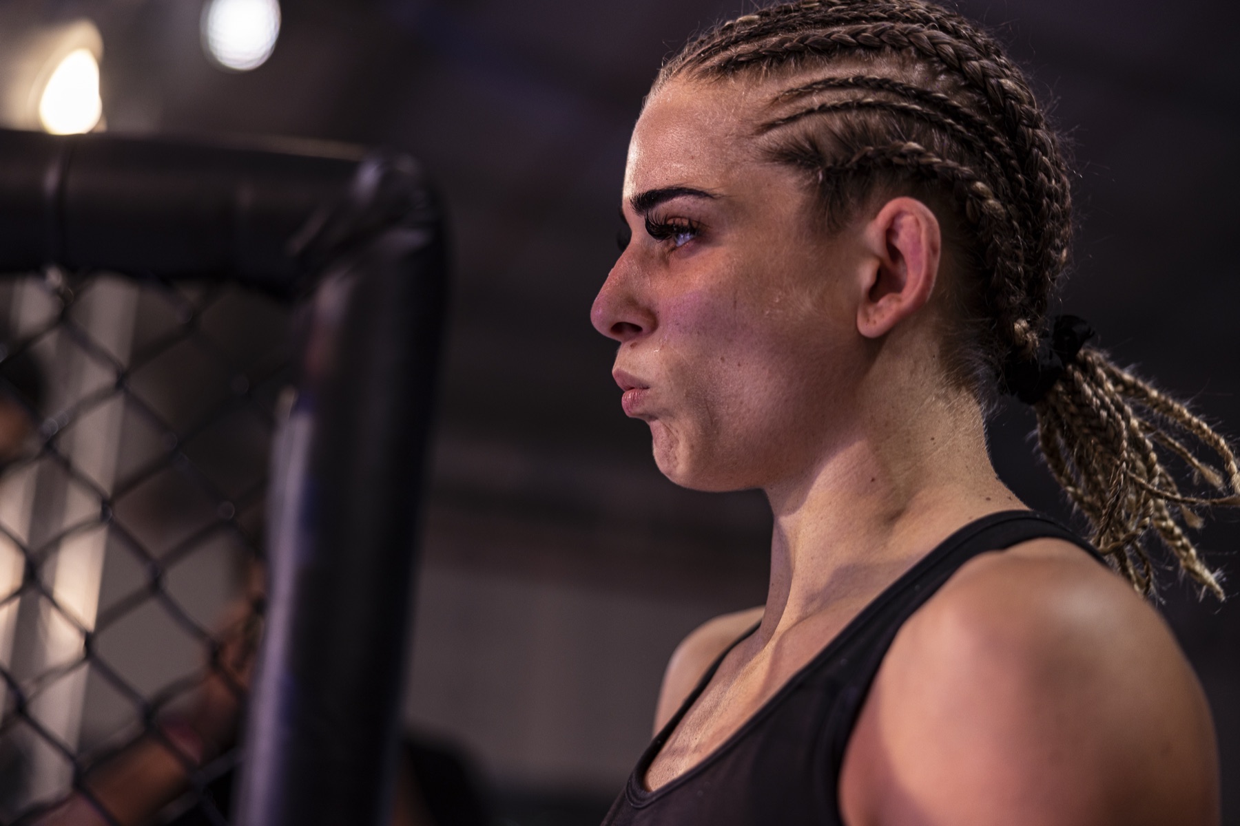 Close portrait of Kate Bacik at the edge of the cage
